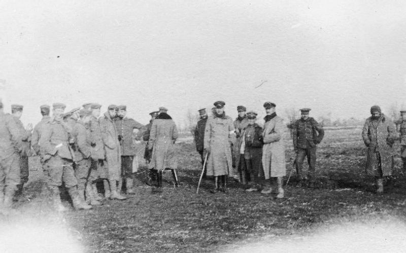 British and German troops meeting in No Man's Land, Christmas 1914.